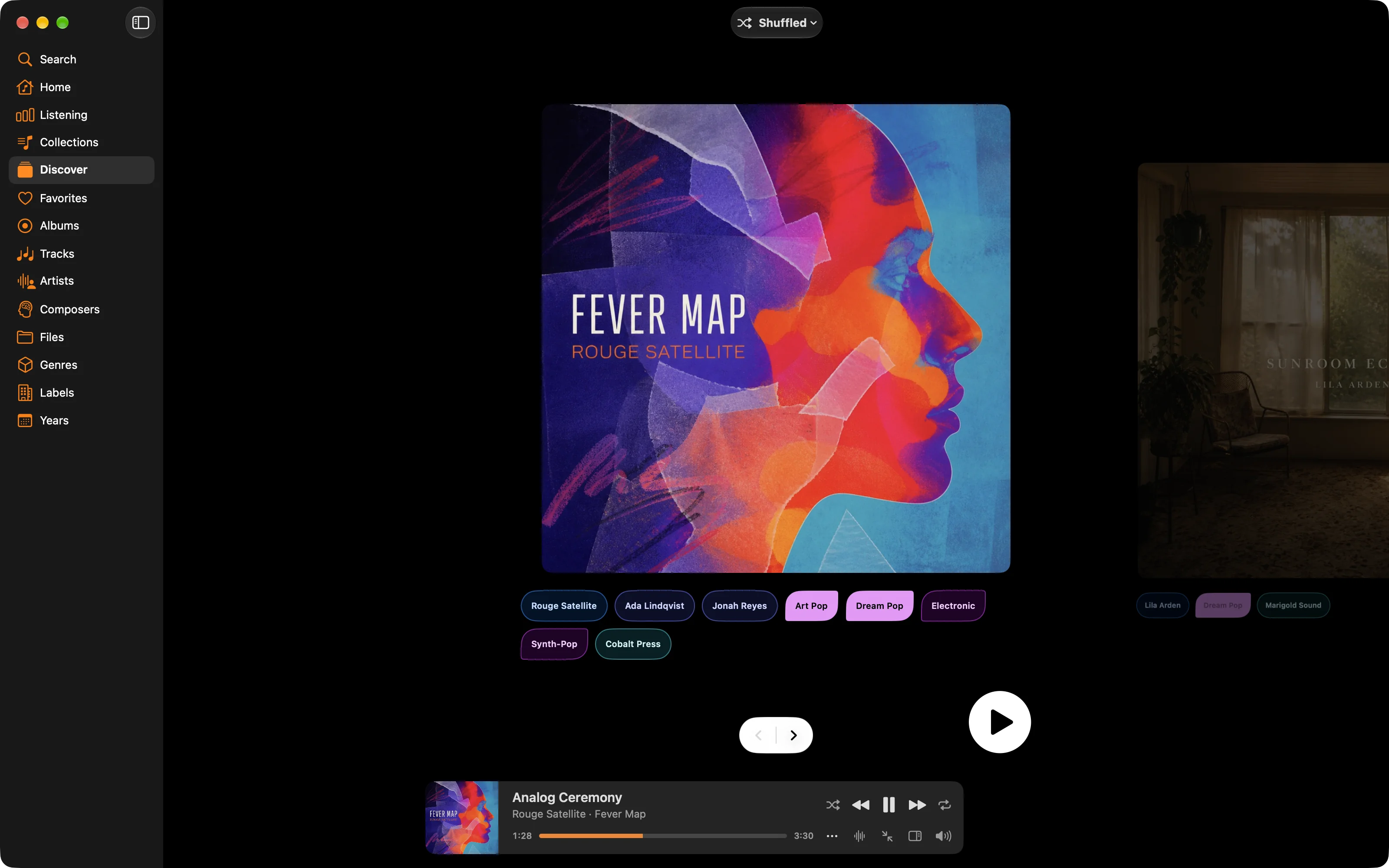 MiniMoon Discover showing one album cover at a time, with its tags below